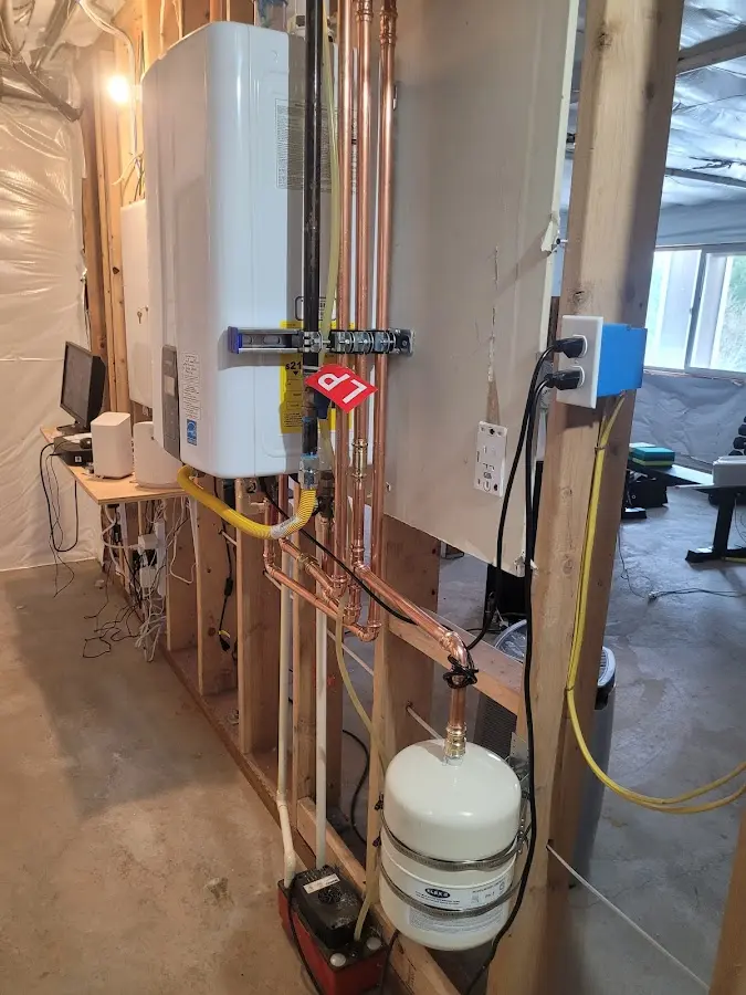 Licensed plumber repairing a kitchen sink in Steubenville
