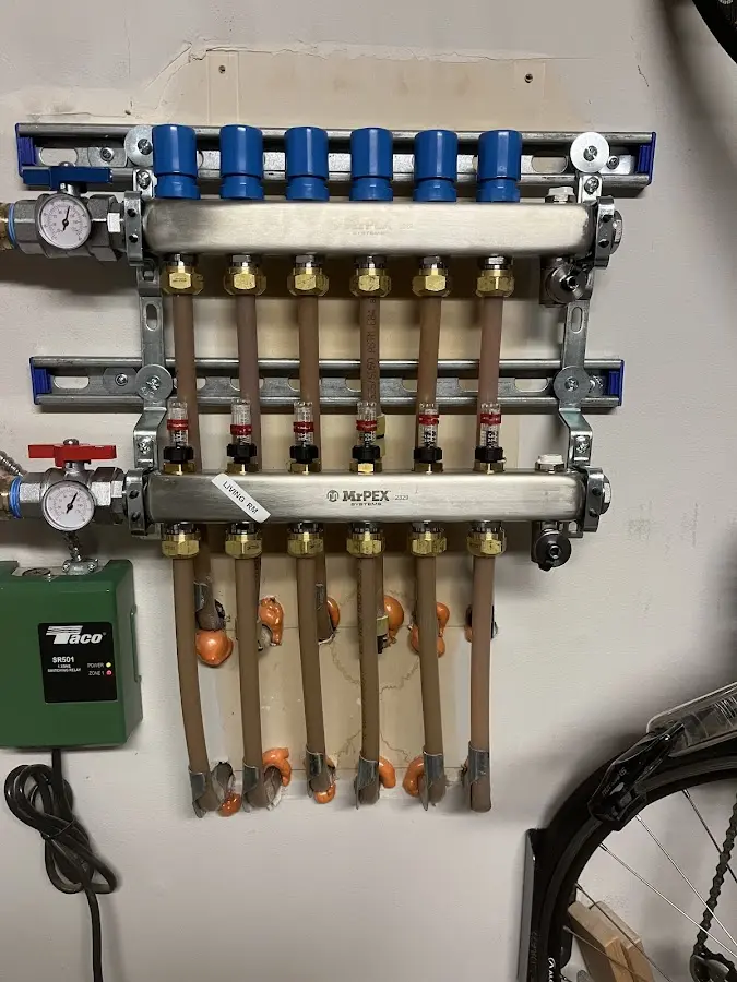 Plumber performing Gas Line Installation at a residential property in Steubenville